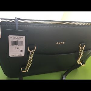 My DKNY BRAND NEW never used exclusive arm bag.